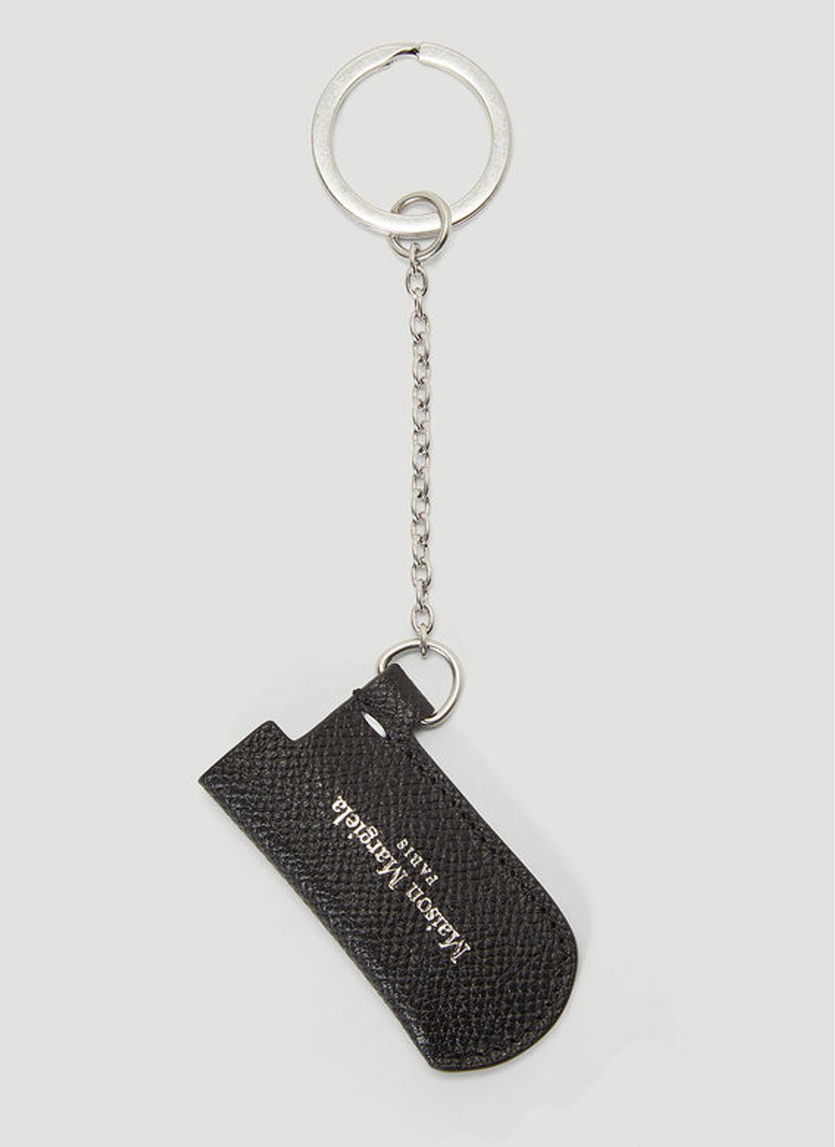 Maison Margiela Lighter Case Keyring In Black WHAT’S ON THE STAR?